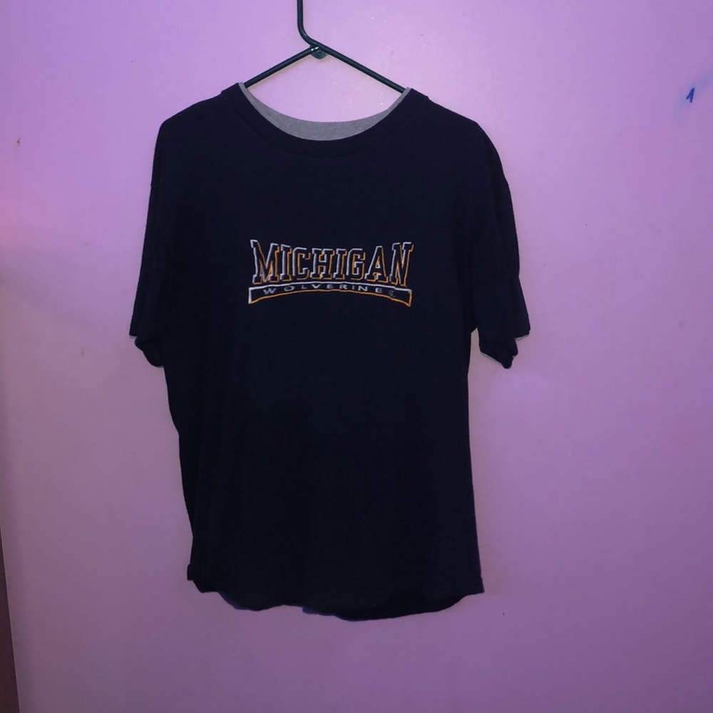 A Michigan Wolverine shirt